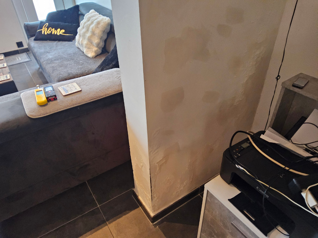 Vochtplekken op muur